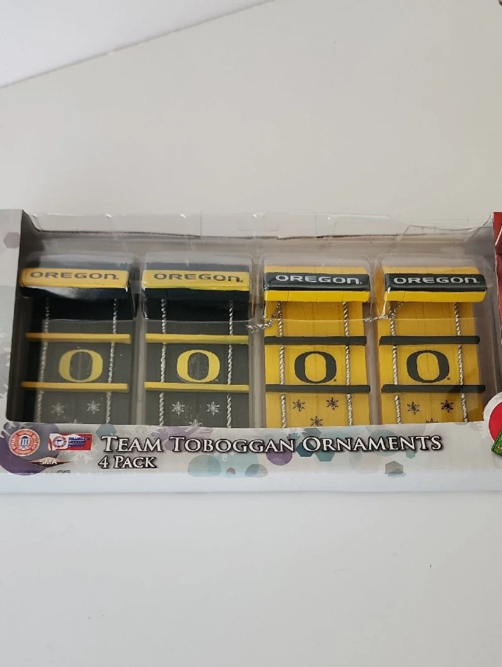 Forever Collectibles Oregon Team Toboggan Ornaments - Green and Yellow 4-Pack
